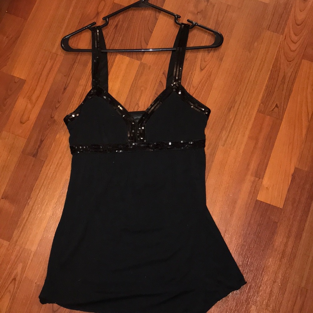 Black Express camisole will sequence trim.